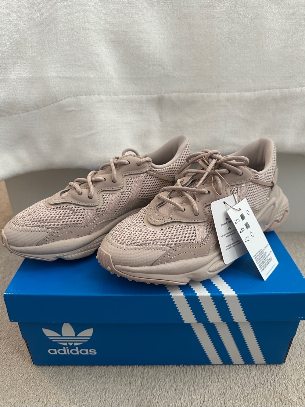 adidas ozweego sneakers in blush